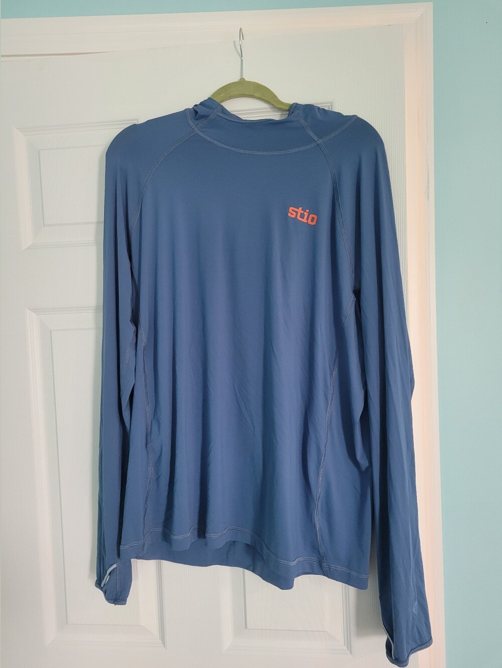 Stio Men's Long-Sleeve Hooded Top in Slate Blue with Coral Logo